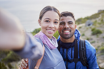Buy stock photo Man, woman and hiking selfie portrait with love, happiness and nature for outdoor adventure on holiday. Young happy couple, blog and mountain for care, bonding and vacation with social network