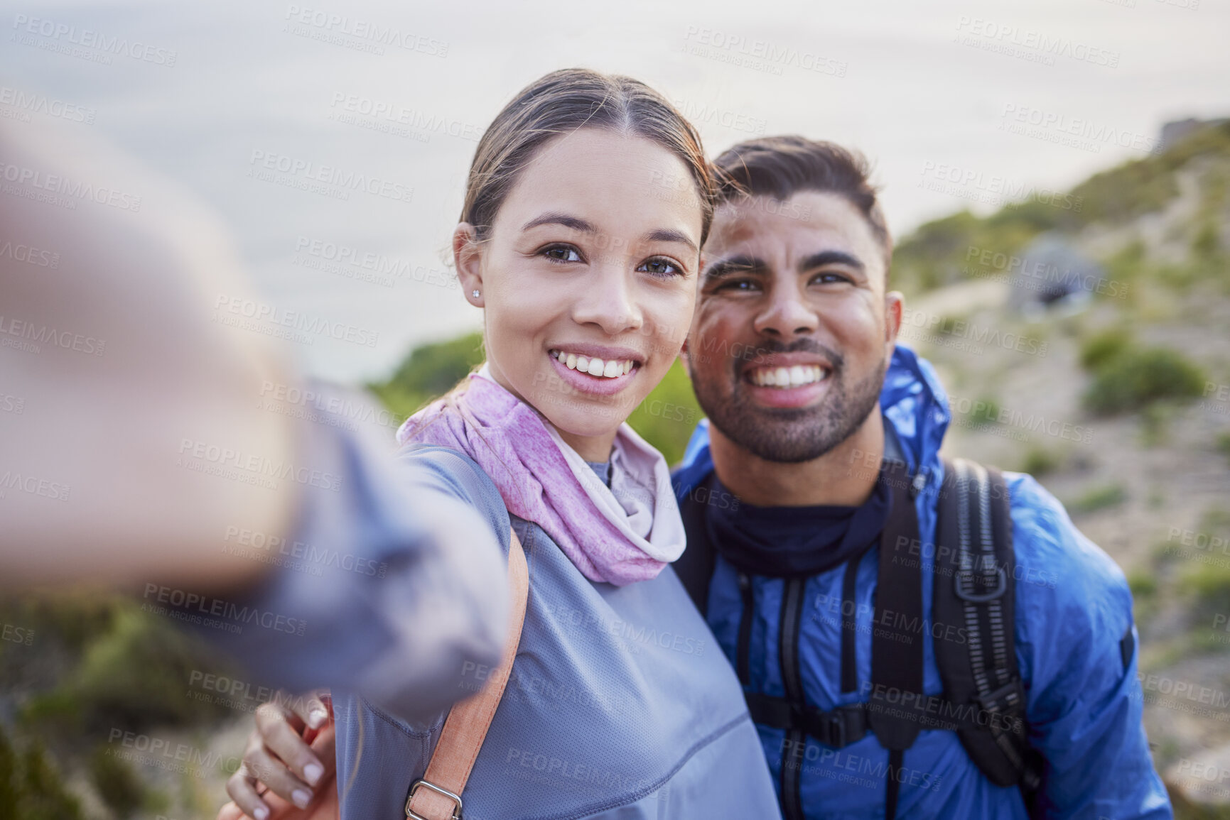 Buy stock photo Man, woman and hiking selfie portrait with love, happiness and nature for outdoor adventure on holiday. Young happy couple, blog and mountain for care, bonding and vacation with social network