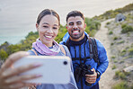 Man, woman and hiking selfie with smile, love and happiness in nature for outdoor adventure on holiday. Young happy couple, blog ux and mountain for care, bonding and vacation with social media app