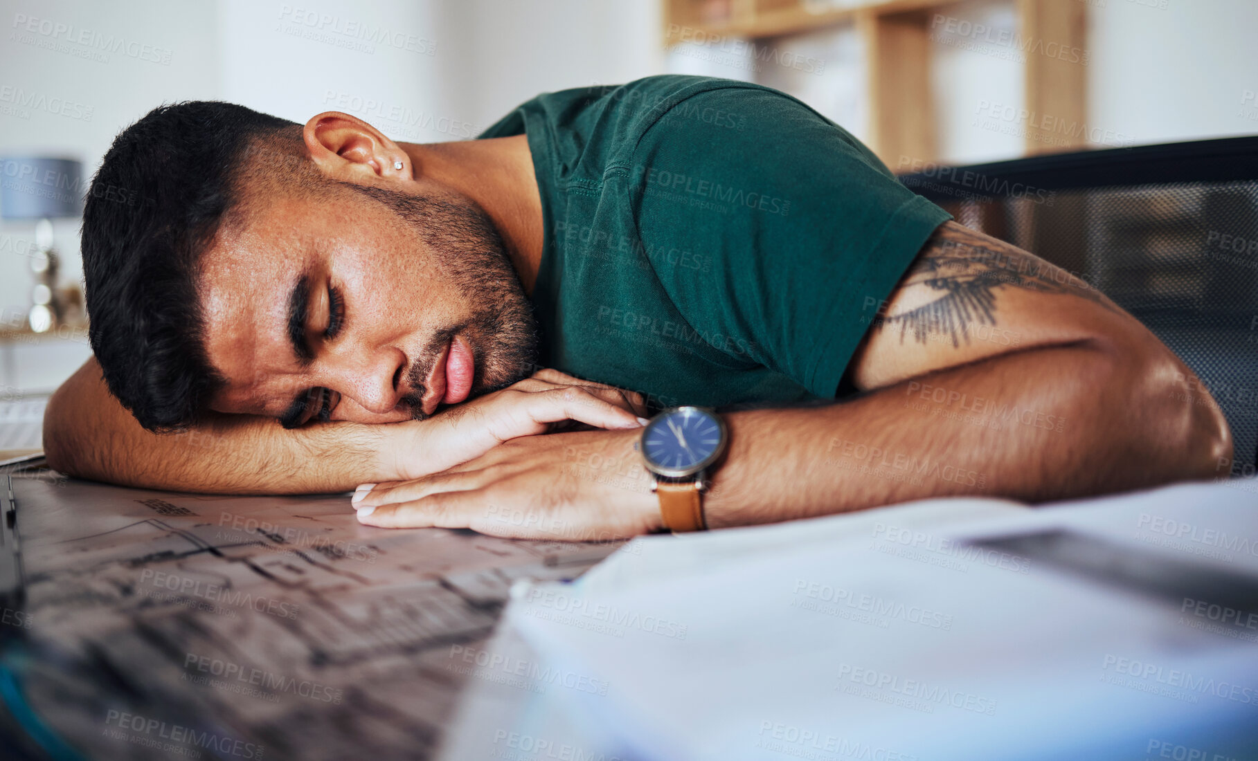Buy stock photo Tired, burnout and man sleeping on a desk after studying, education or stress from remote work. Lazy, nap and student with fatigue, sleep and resting after learning, exam preparation and homework