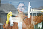 Window cleaning portrait, smile and happy woman at home washing windows with glass cleaner. Helping, working and maid with spray detergent product for house chores and disinfectant wipe with soap