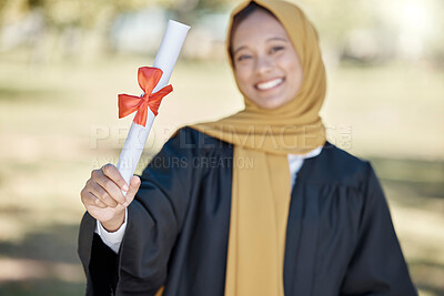 Buy stock photo Graduation, university diploma and Muslim woman with award for success, ceremony and achievement. Education, college and happy graduate smile with certificate, degree and academy scroll on campus