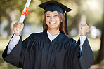 Graduation, university diploma and happy student on campus with smile for ceremony, award and achievement. Education, college and girl graduate celebrate with certificate, degree and academy scroll