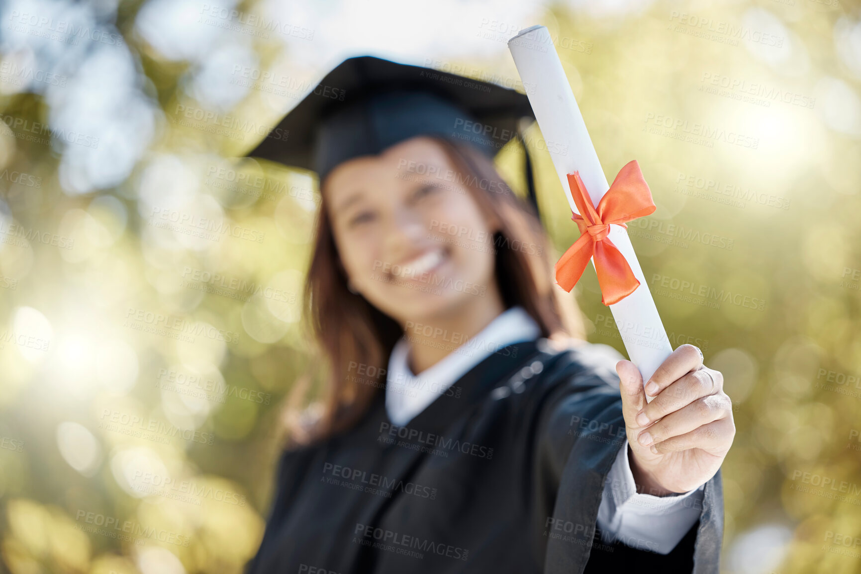 Buy stock photo Portrait, degree and woman outdoor, graduation and knowledge with happiness, success and university. Face, happy female student and academic with document, celebration and achievement with education