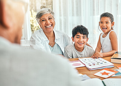 Buy stock photo Happy, homework and grandmother sitting with her grandchildren helping them with fun activities. Happiness, smile and elderly woman spending time and bonding with kids outdoor of the family home.