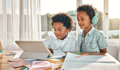 Buy stock photo Tablet, headphones and children doing a elearning class together in the dining room at home. Technology, online school and boy kids or brothers watching virtual lesson on mobile device in their house