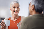 Coffee, smile and senior woman in a conversation with her friend in a cafe in the morning. Happy, excited and elderly female talking to a lady while drinking a warm beverage in a coffee shop together