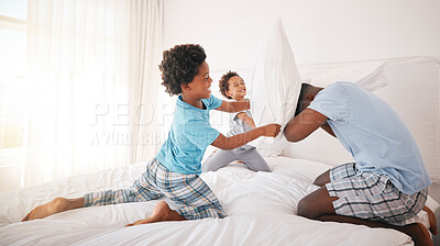 Buy stock photo Black family, pillow fight and bedroom bonding of a father, children and fun in a home. Papa, kids and crazy play fighting of youth with energy in the morning in a house with dad feeling love