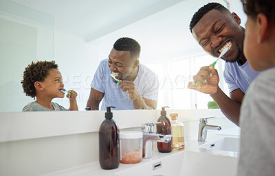 Buy stock photo Dental hygiene, father and son brushing teeth, morning routine and wellness in bathroom with smile. Love, dad and boy oral health, cleaning mouth and child development with happiness and self care