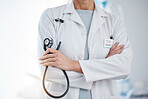 Medicine, stethoscope and a doctor with arms crossed for healthcare, hospital work and cardiology. Insurance, nursing and a gp ready for a consultation, surgery or medical service at a clinic