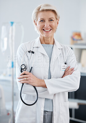 Buy stock photo Portrait, woman and doctor with arms crossed, stethoscope and happiness in hospital, clinic and surgery. Mature female medical worker smile for healthcare services, cardiology wellness and experience