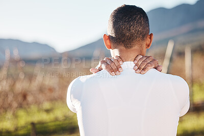 Buy stock photo Fitness, nature and man with a back injury, pain or accident after running training for race. Sports, medical emergency and male athlete with sprain muscle, injured or sore body after cardio workout.