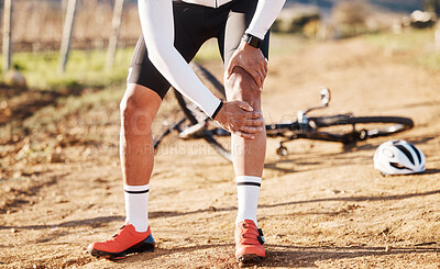 Buy stock photo Injury, fitness and man with knee pain while cycling, cramp or inflammation during countryside cardio. Exercise, injured and biker with a sprain after a fall, accident or training for a competition