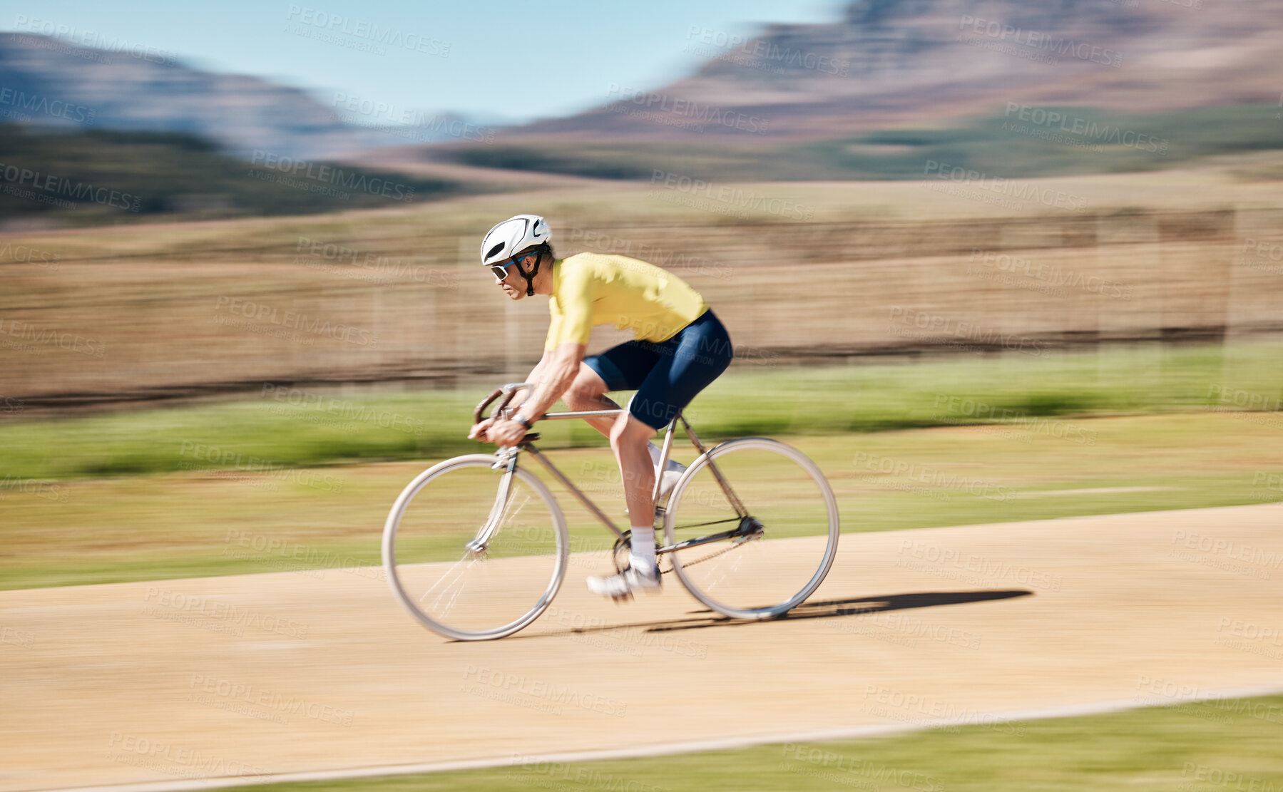 Buy stock photo Man cycling with blurred background speed in nature, countryside and training for triathlon, sports and power. Cyclist, bicycle and motion of bike for fitness, energy and exercise performance on path
