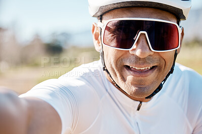 Buy stock photo Selfie, portrait and man in nature for cycling, sports memory and enjoying a ride in the countryside. Smile, fitness and face of a biker taking a photo while riding in France for a race or triathlon