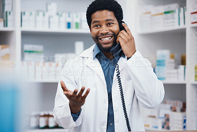 Buy stock photo Pharmacist, black man or phone call in patient help, customer consulting or telehealth medicine service in drugstore. Smile, happy or talking pharmacy worker on telephone in healthcare product advice