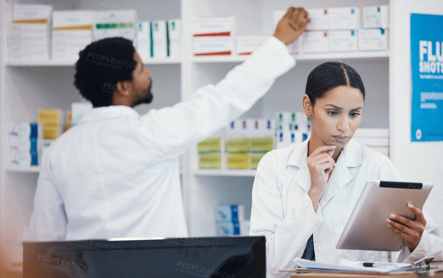Buy stock photo Thinking pharmacist, woman and tablet in medicine check, stock take or medical research in drugs store. Serious, ideas and pharmacy worker on technology pills, checklist or ecommerce healthcare order