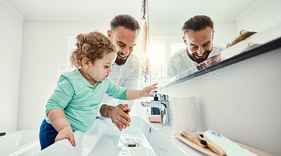 Buy stock photo Cleaning, washing hands and father with baby in bathroom for hygiene, wellness and healthcare at home. Family, skincare and dad with child learning to wash with water, soap and disinfection by faucet