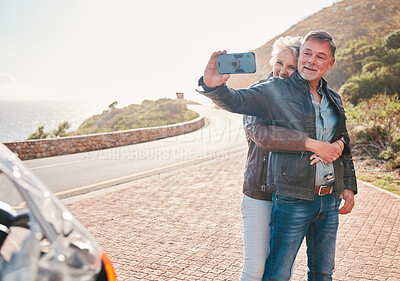 Buy stock photo Mountain, bikers and couple taking a selfie together while on an adventure, vacation or weekend trip. Freedom, nature and senior man and woman in retirement taking a picture while on a motorbike ride