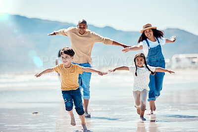 Buy stock photo Family, beach and parents running with children for bonding, quality time and adventure together. Travel, love and happy mom, dad and kids enjoy summer holiday, vacation and relax on weekend by sea