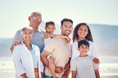 Buy stock photo Big family, portrait of grandparents and kids with parents, smile and happy bonding together on ocean vacation. Sun, fun and happiness for generations of men and women with children on beach holiday.