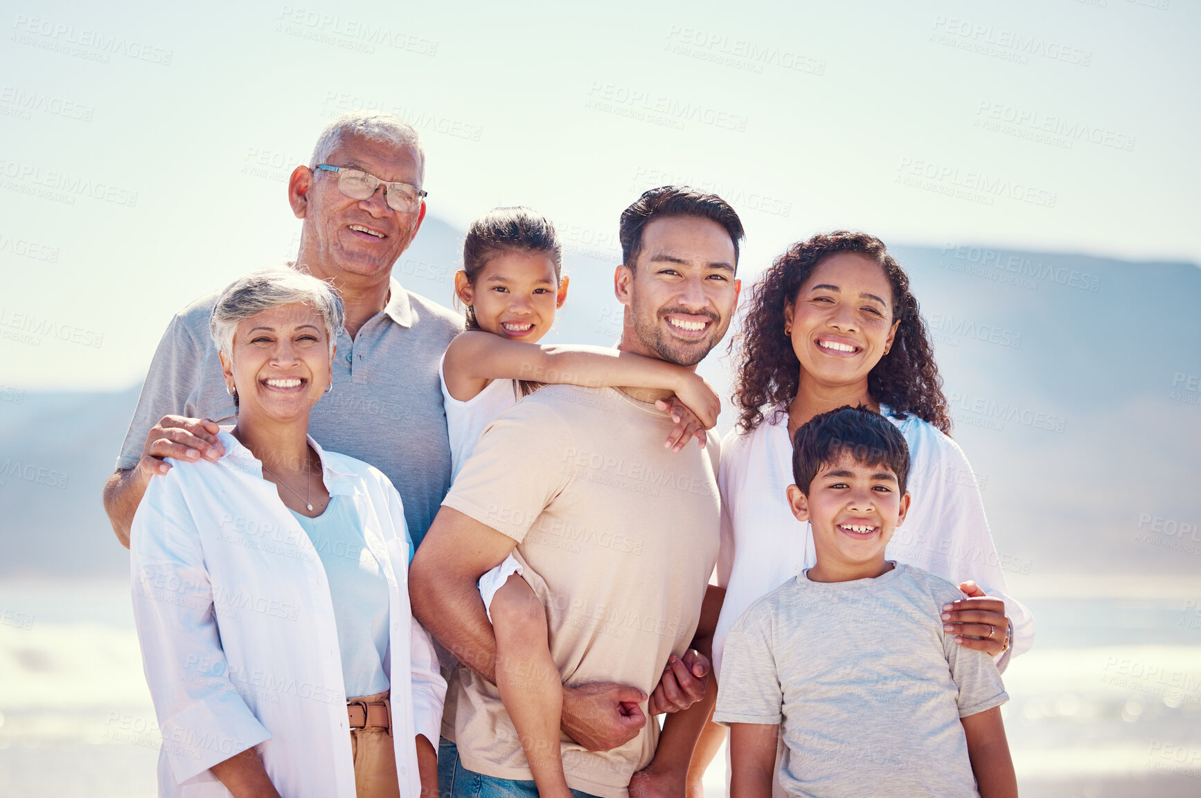 Buy stock photo Big family, portrait of grandparents and kids with parents, smile and happy bonding together on ocean vacation. Sun, fun and happiness for generations of men and women with children on beach holiday.