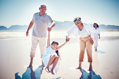 Buy stock photo Beach, family holding hands and grandparents with kid playing and walking on ocean sand together. Fun, vacation and happy senior man and woman with children bonding, quality time and summer in nature