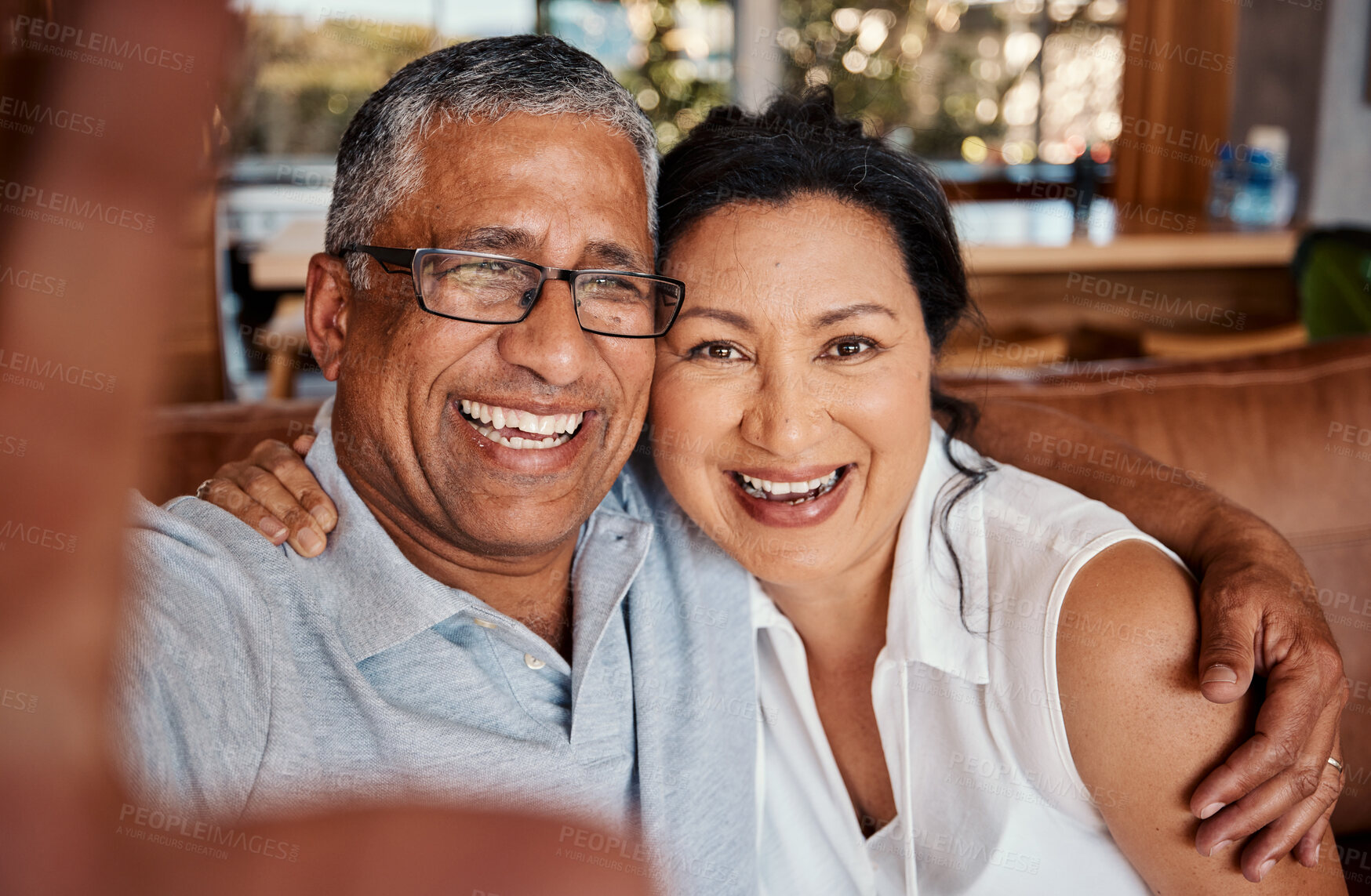 Buy stock photo Portrait, selfie and laughing senior couple taking pictures in home for social media, happy memory or profile picture. Love, retirement smile and photography or photo of elderly man and woman.