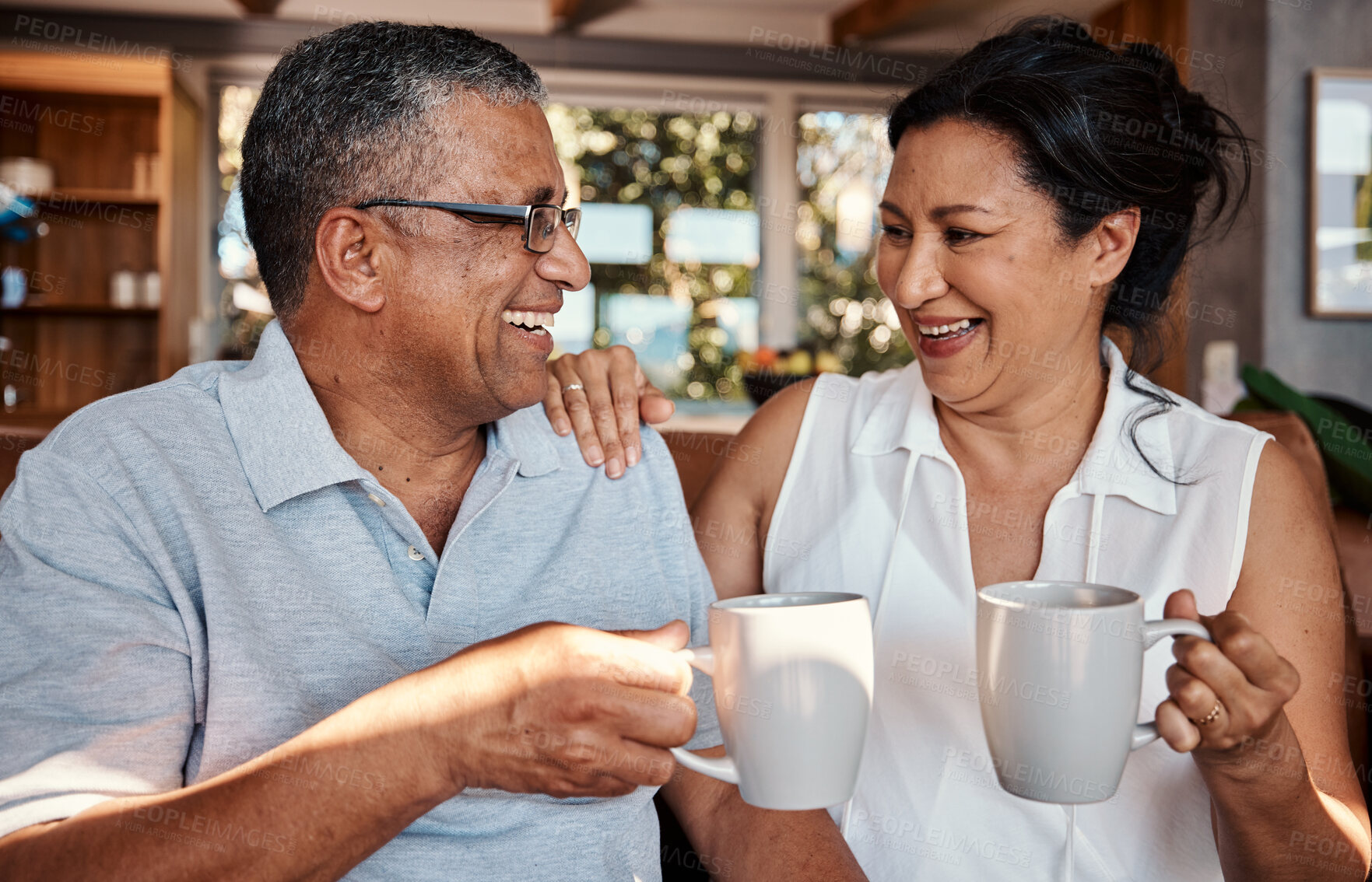 Buy stock photo Coffee, toast and senior couple laughing in home, having fun and bonding. Love, tea cheers and smile of happy, retired and elderly man and woman drinking espresso and enjoying funny conversation.