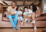 Black family, living room sofa and bonding of a mother, father and kids on a couch with happiness. Happy, parent love and support of girl kids laughing in a home together with a smile in a home