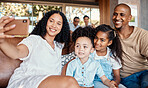 Family, relax and selfie smile in home, having fun and bonding together. Interracial, photographer and father, mother and girls taking pictures or photo for social media and happy memory in house.