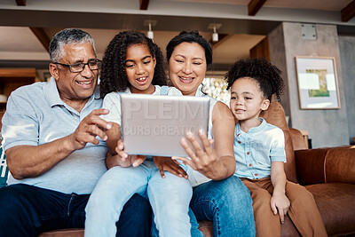 Buy stock photo Relax, family and girls with tablet on sofa in home living room for social media or funny video streaming. Technology, care or happy grandfather, grandma and kids laughing or bonding with touchscreen