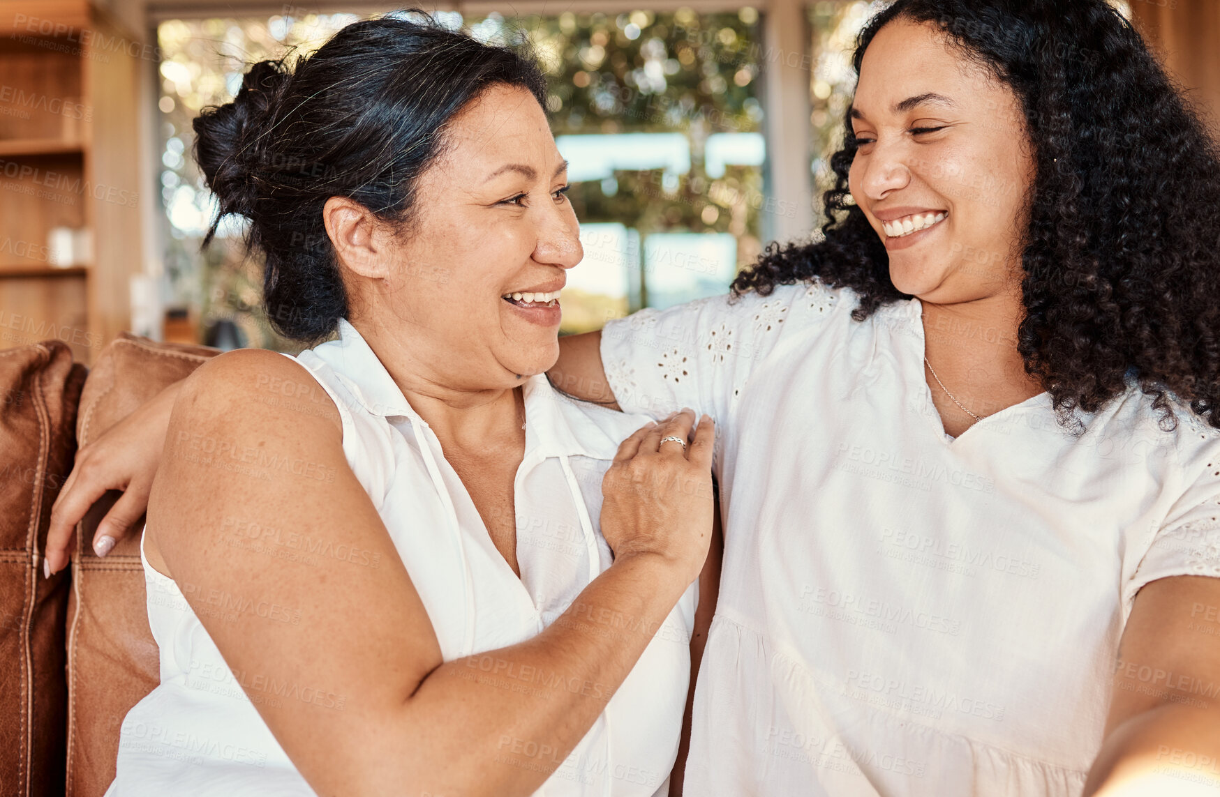 Buy stock photo Woman, senior mother and smile of family on a living room sofa with happiness and bonding. Mama love, support and happy elderly care with women on a lounge couch in a house together with a hug