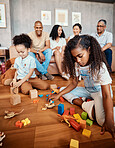 Family, happy and children playing with blocks for education, learning and curiosity. Living room, playful and kids with toys for mental development, childhood and hobby with parents and grandparents