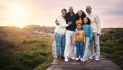 Buy stock photo Happy family, portrait and people on vacation or holiday smile on a boardwalk and embrace together during sunset. Trip, getaway and grandparents with parents and children or kids bonding