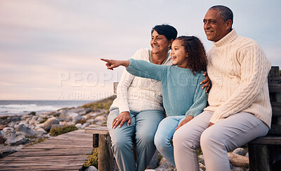 Buy stock photo Love, beach and child on vacation with her grandparents sightseeing, bonding and having fun together. Travel, happy and elderly couple in retirement on a seaside holiday with a girl kid in Mexico.