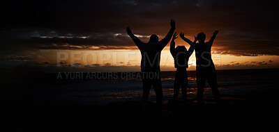 Buy stock photo Freedom, sunset and silhouette of a family at the beach while on a summer vacation or weekend trip. Adventure, carefree and shadow of people by the ocean together while on a seaside travel holiday.