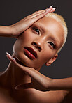 Skincare, makeup and black woman with hands on face in dark studio, platinum hair isolated on grey background. Art aesthetic, cosmetics and African beauty model and luxury spa facial for bronze skin.