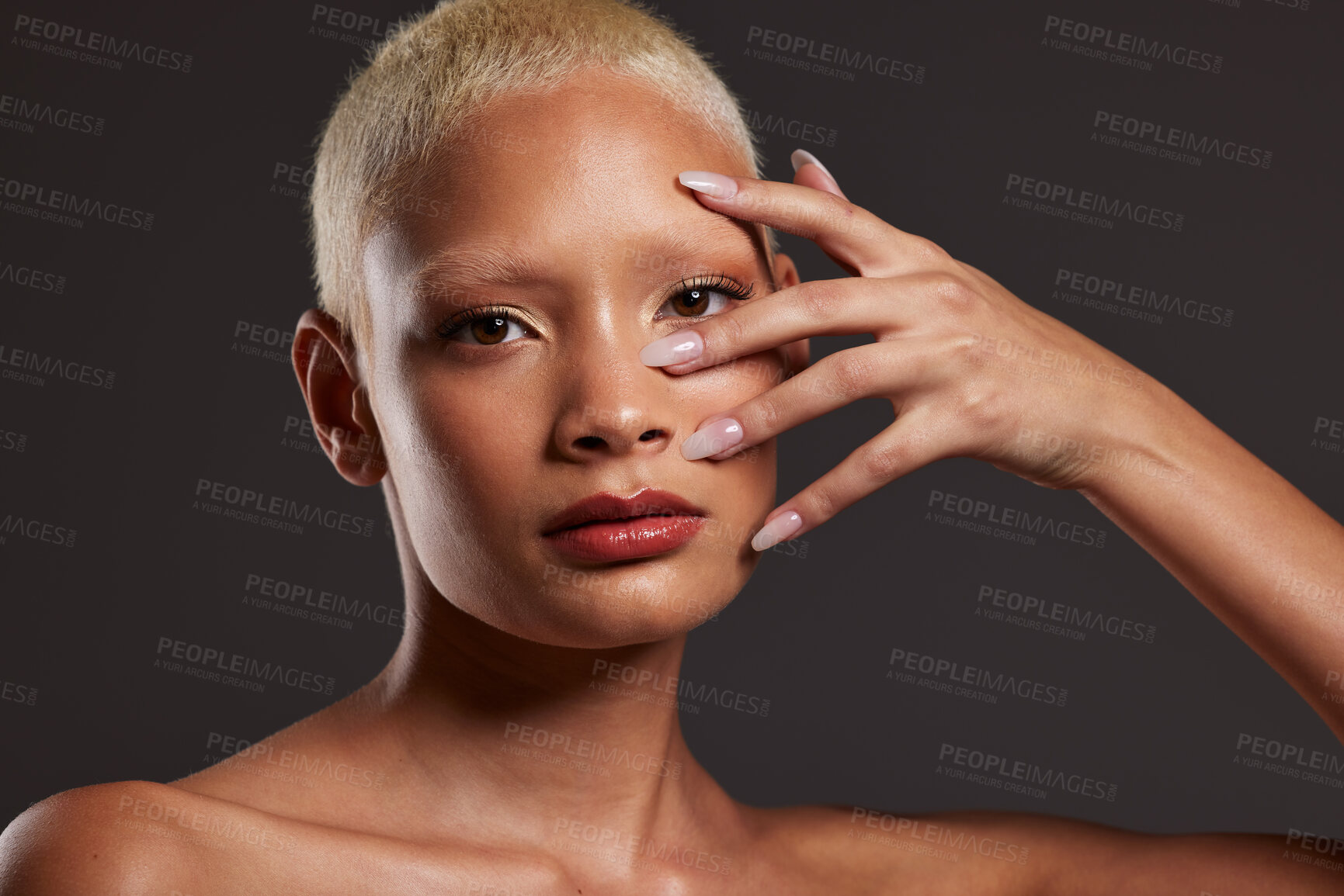 Buy stock photo Makeup, hands on face and portrait of woman in studio for beauty products, cosmetics and skincare. Salon aesthetic, cosmetology and girl model for manicure, self love and beauty on gray background