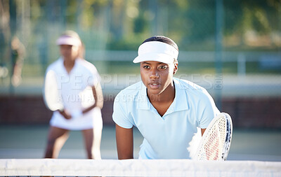 Buy stock photo Tennis, sport and serious black woman on outdoor court, train and fitness, collaboration and ready for game. Exercise, workout and female wait for serve, determined athlete and workout with racket