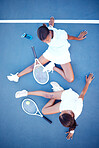 Top view, tennis and women tired, conversation and exhausted after match, training and happiness for sport. Female athletes, players or friends with rackets, workout or practice for healthy lifestyle