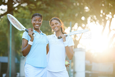 Buy stock photo Tennis, team and happy in portrait with women outdoor, sun and lens flare with sports and fitness, collaboration and hug. Exercise, female smile with athlete and workout with partnership and racket