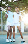 Portrait, tennis and teamwork with sports women standing on a court outdoor together ready for a game. Fitness, collaboration or doubles partner with a serious female athlete and friend outside