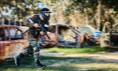 Buy stock photo Man, paintball and rush for intense battle or war in the forest running to attack on grass field. Male paintballer or soldier moving fast to push enemy defense in extreme adrenaline sports outdoors