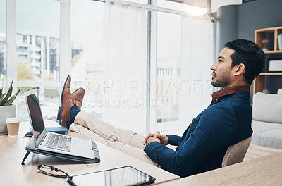 Buy stock photo Office, feet up and businessman working on laptop, thinking and unsure of design or proposal. Unsure, doubt and pensive leader relax while contemplating, brainstorming or deciding mission plan