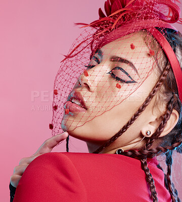 Buy stock photo Stylish, fashion and a woman with a face net isolated on a pink background in a studio. Fashionable, style and model with headwear and a veil on a hat as a fancy, classy and elegant accessory