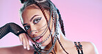 Black woman, bdsm portrait and chain mask with metal, rock or punk aesthetic by pink background. Gen z model, sexy and grunge with trippy, psychedelic and creative with steel jewellery, face and mask