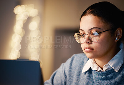 Buy stock photo Business, student or concentration laptop in night office on financial software, investment data or mockup growth analytics. Serious, reading and working late woman on technology for finance learning