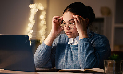 Buy stock photo Latino woman, headache and online stress at laptop of a student with learning burnout. Night, online university project and anxiety of a young female with glasses and blurred background in the dark