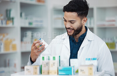 Buy stock photo Pharmacy, medicine and shelf with man in store for healthcare, drugs dispensary and treatment prescription. Medical, pills and shopping with pharmacist for check, label information and product